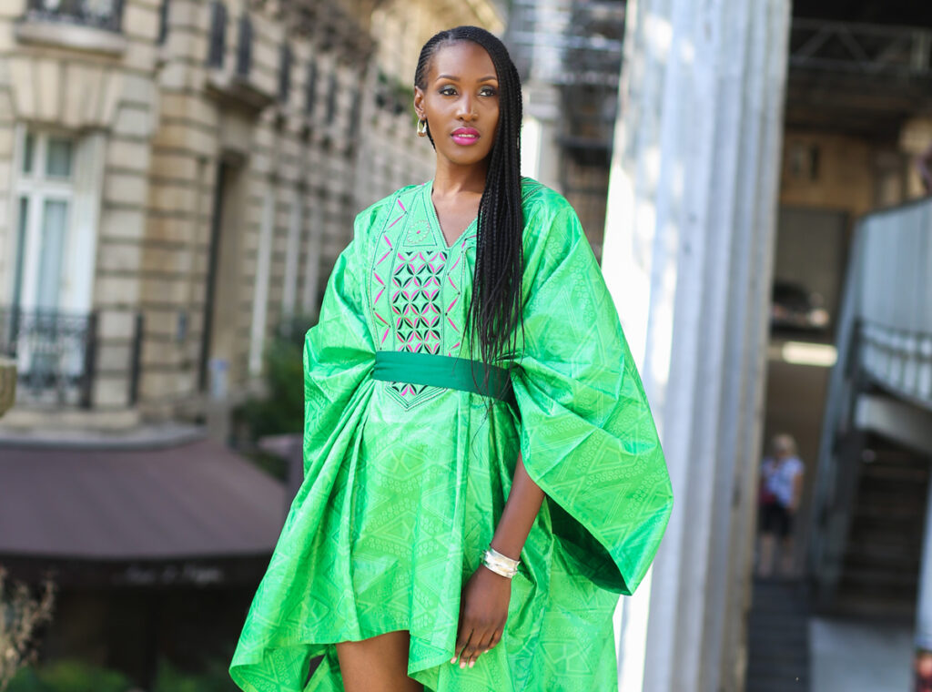 Nil from Women of the African Diaspora photo book wearing DBN Bazin and Fulaba Fulani jewelry